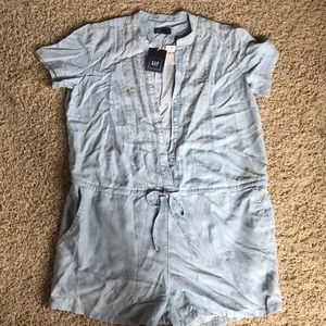 ADORABLE NWT JEAN ROMPER WITH DETAILING.